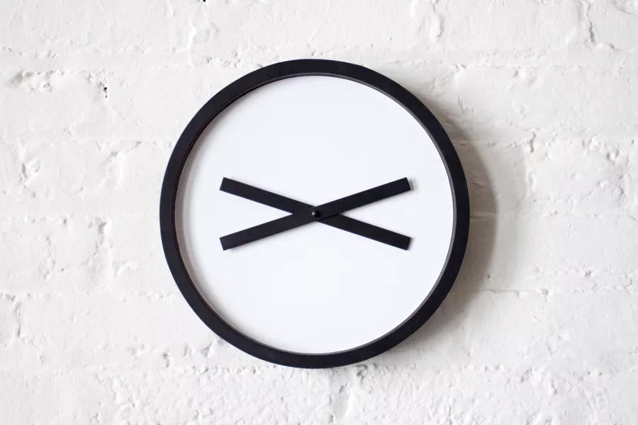 Close-up photo of Timepeace clock on classroom wall.